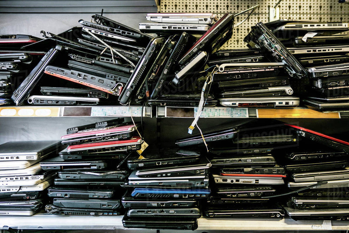 a pile of laptops
